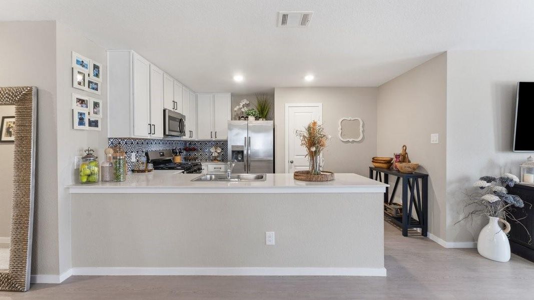Furnished interior view inside a new home in Trails at Cochran Ranch, Waller (Image 28).