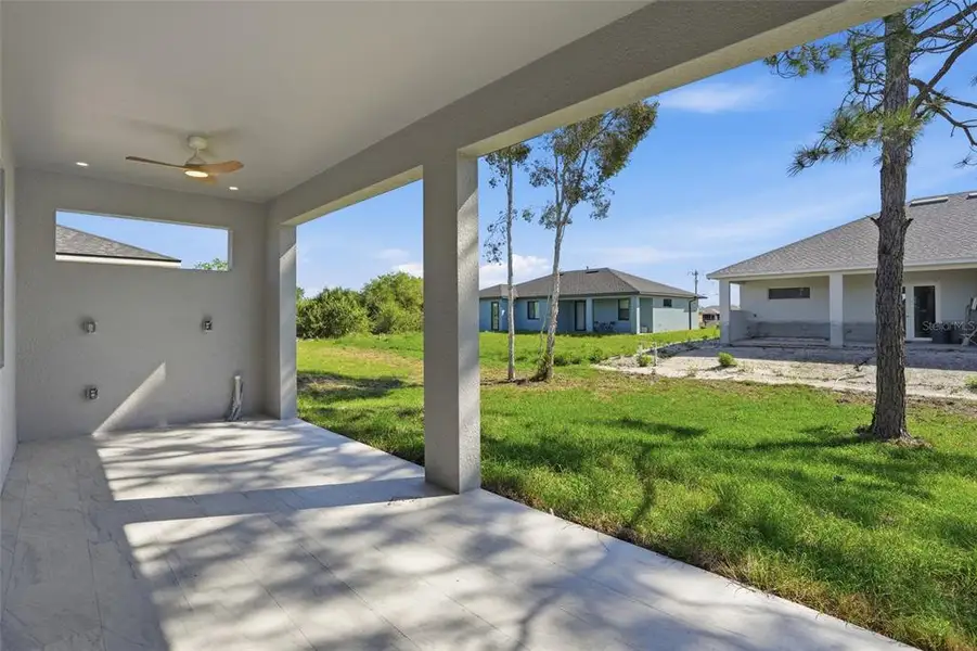 Exterior details and patio area of a home in , Lehigh Acres (Image 3). Exterior details and patio area of a home in , Lehigh Acres (Image 3).