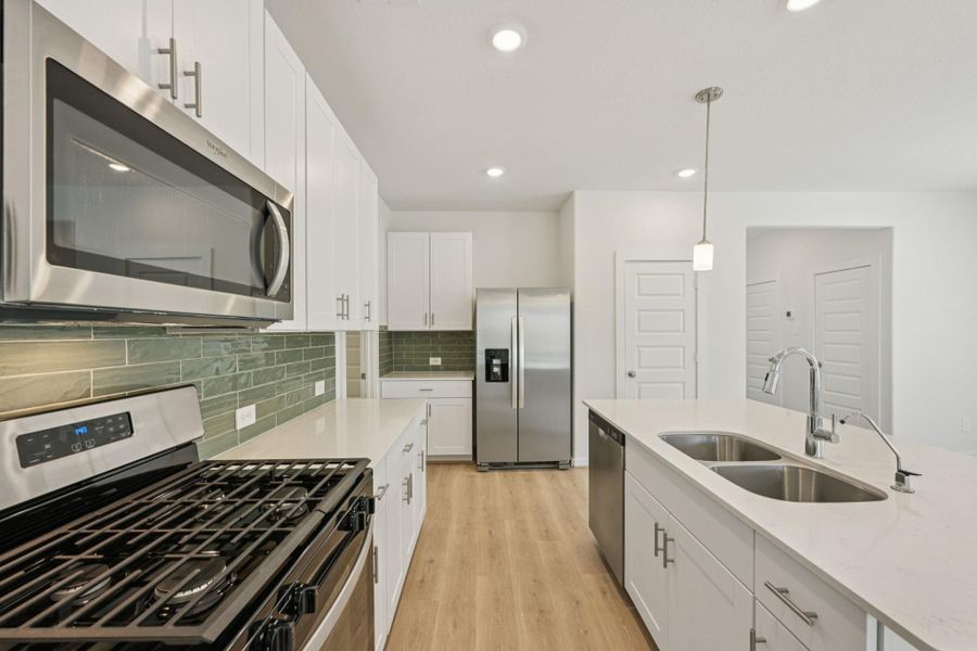 Furnished interior view inside a new home in Pine Lake Cove - Traditional Series, Montgomery (Image 12).
