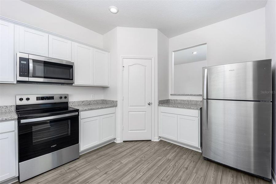 Furnished interior view inside a new home in Gum Lake Preserve, Lake Alfred (Image 10).