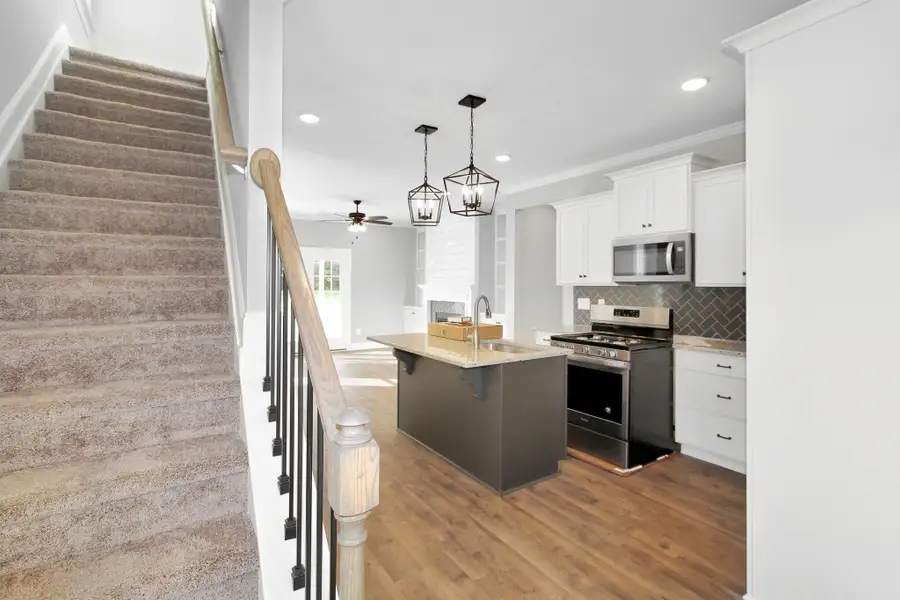Representative furnished interior of a home built from the Furyk by RiverWILD Homes in Riverwood Ranch, Clayton (Image 12).