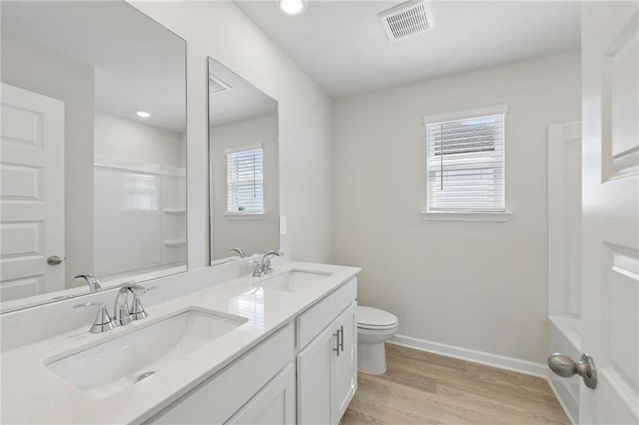 Furnished interior view inside a new home in Hemingway - Reserve Series, Cumming (Image 6).