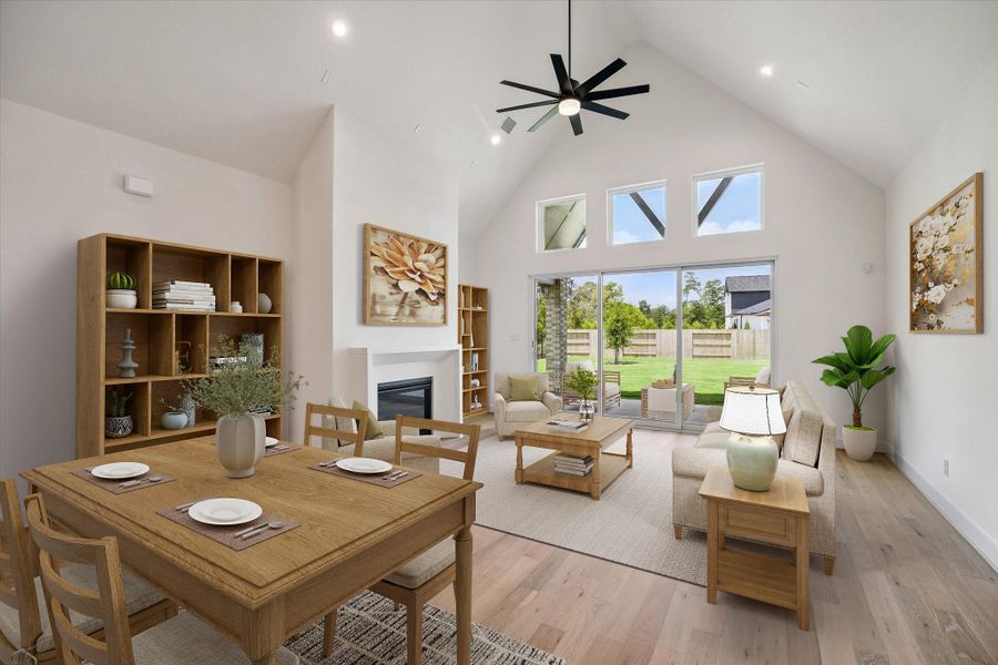 View of the Dining and Living area. This photo has been virtually staged.