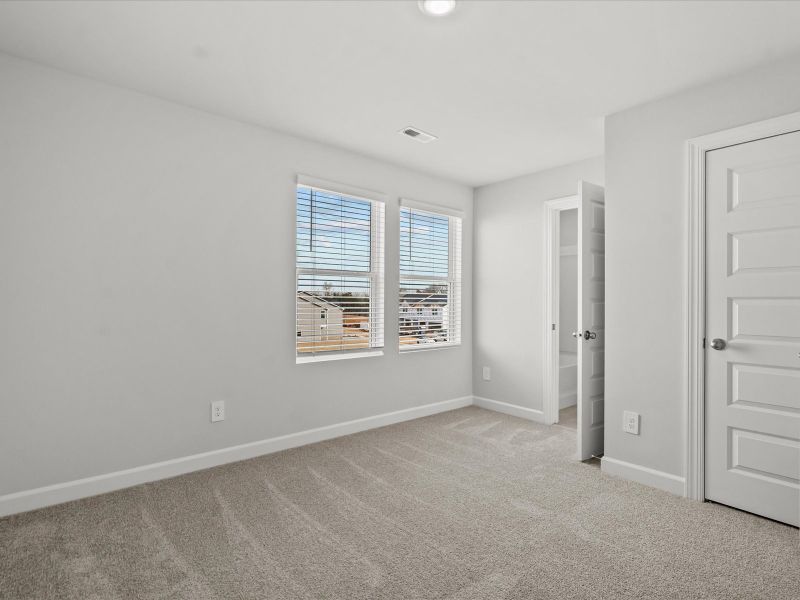 Spacious, unfurnished interior of a new home in Northbrook Village Townes, Taylors (Image 19).