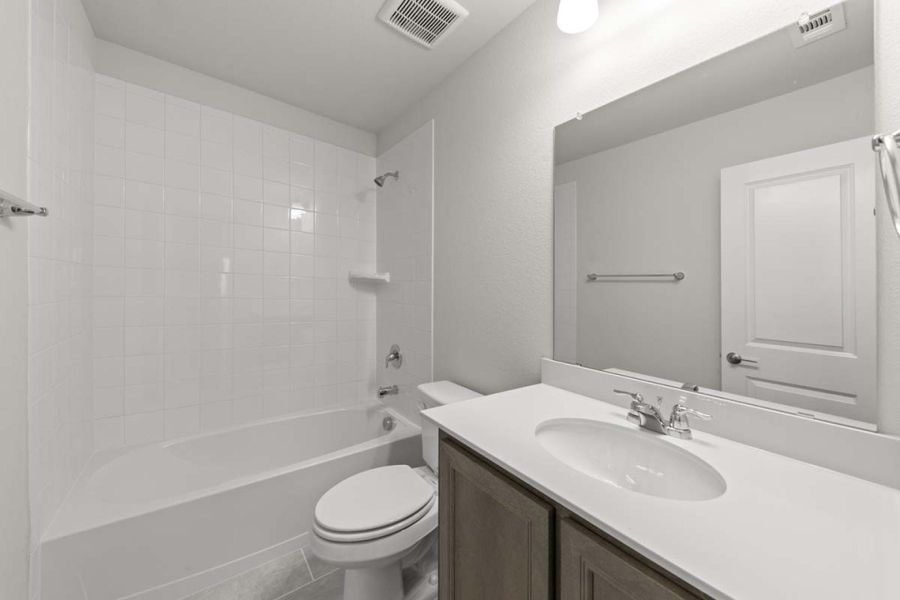 Furnished interior view inside a new home in Keeneland, Aubrey (Image 10). Furnished interior view inside a new home in Keeneland, Aubrey (Image 10).