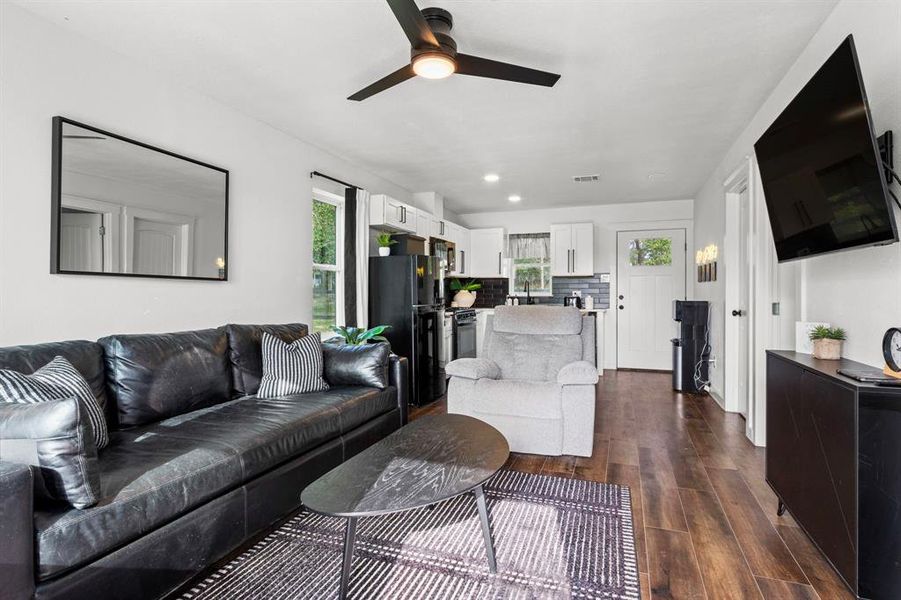 This open floor plan guest home shares space with the kitchen and living area.