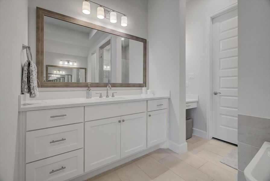 Her private vanity offers soft-close cabinets and drawers, plus a separate makeup vanity with exceptional lighting—an ideal setup for both convenience and luxury.