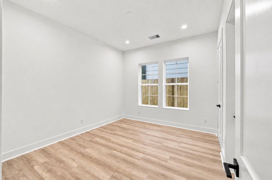 Bedroom 3 on the 1st floor includes a closet and full bathroom.