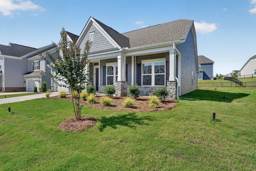 Front exterior of a new home in Estates at Sugar Creek, Fort Mill, SC, highlighting curb appeal (Image 18).