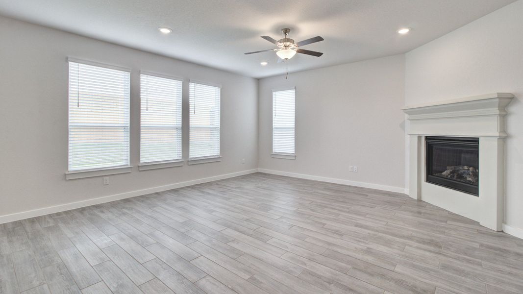 Representative furnished interior of a home built from the Majestic by Brightland Homes in Sunterra, Katy (Image 7).