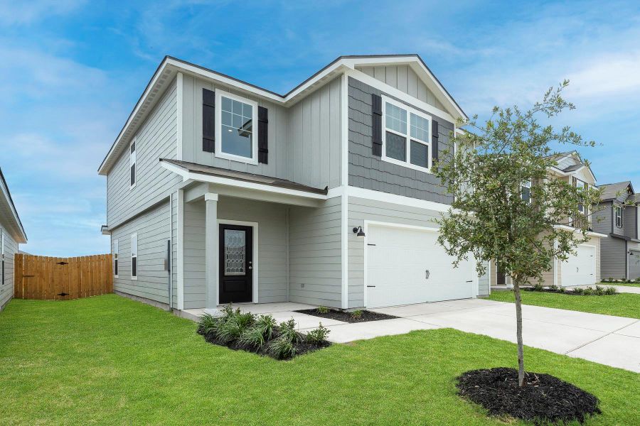 Front exterior of a new home in Sunset Oaks, Maxwell, TX, highlighting curb appeal (Image 2). Front exterior of a new home in Sunset Oaks, Maxwell, TX, highlighting curb appeal (Image 2).