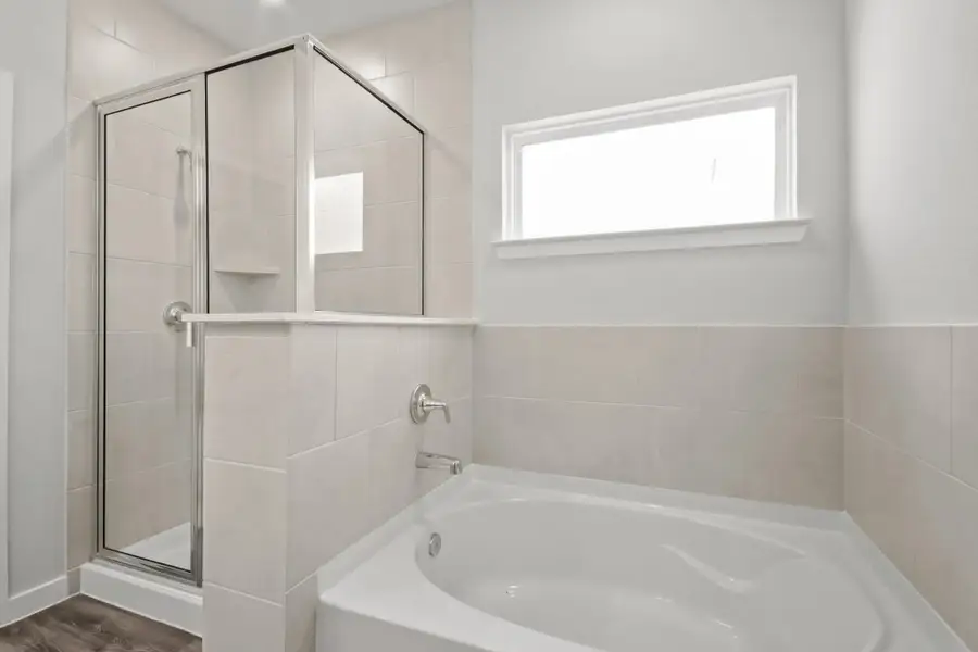 Furnished interior view inside a new home in The Woodlands Hills, Willis (Image 4). Furnished interior view inside a new home in The Woodlands Hills, Willis (Image 4).