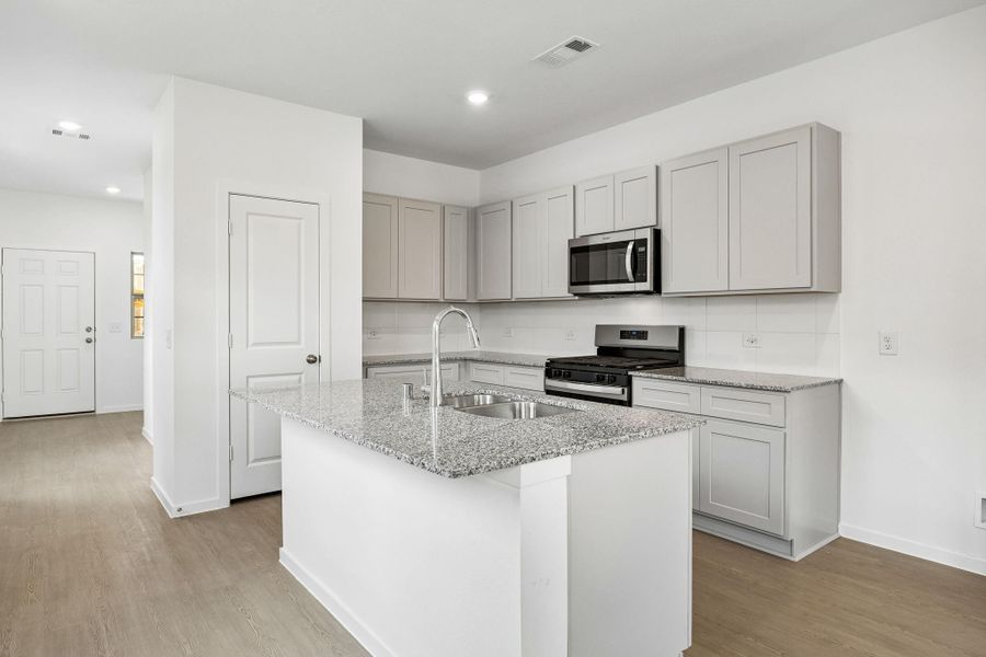 Furnished interior view inside a new home in Mavera, Conroe (Image 9).