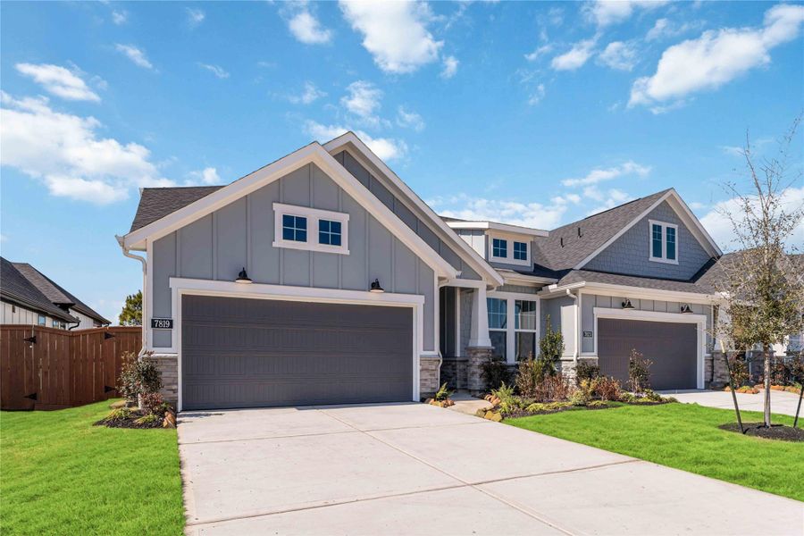 Front exterior of a new home in Elyson, Katy, TX, highlighting curb appeal (Image 2).