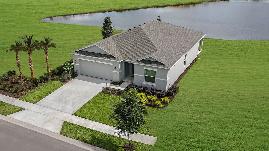 Representative exterior photo of a completed home built from the Goldfinch by Taylor Morrison in Solena, North Fort Myers, FL (Image 8).