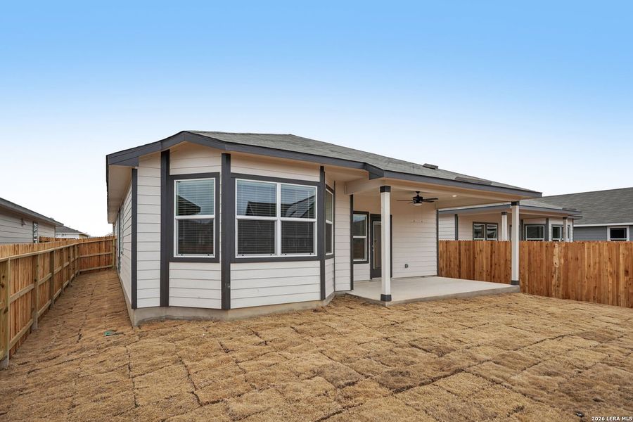 Exterior details and patio area of a home in Estancia Ranch - Premier Series, San Antonio (Image 29).