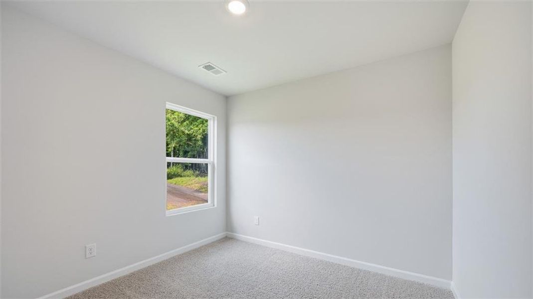 Spacious, unfurnished interior of a new home in Brookland Commons, Monroe (Image 24).