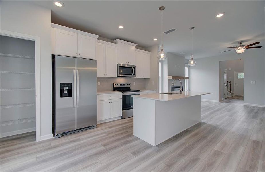 Furnished interior view inside a new home in Enclave at Evergreen, Fairburn (Image 7).