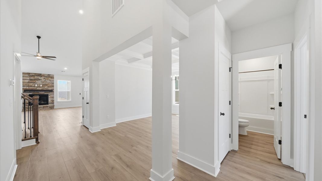 Highly functional foyer with hardwood flooring that flows seamlessly into living spaces located in Moore, SC