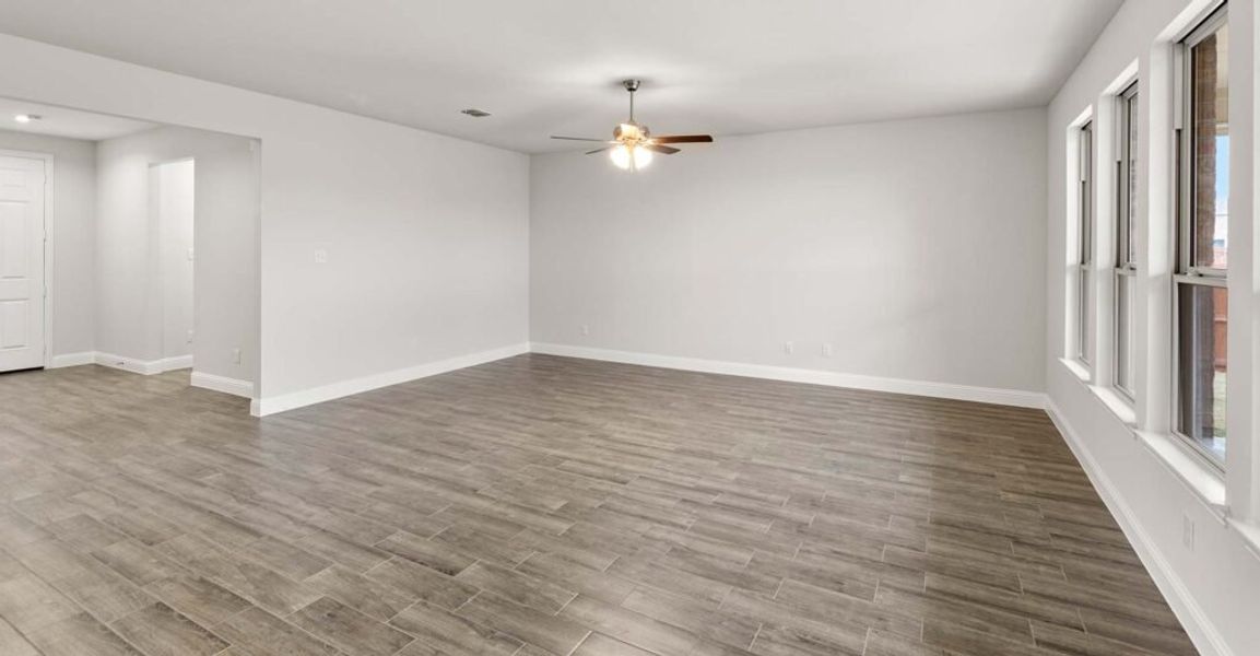 Representative exterior photo of a completed home built from the Thornbury by Impression Homes in Still Water Lake, Godley, TX (Image 11). Representative exterior photo of a completed home built from the Thornbury by Impression Homes in Still Water Lake, Godley, TX (Image 11).