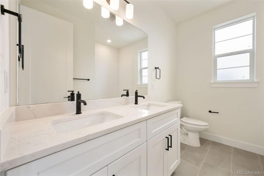 Furnished interior view inside a new home in Festival at RainDance, Windsor (Image 5).