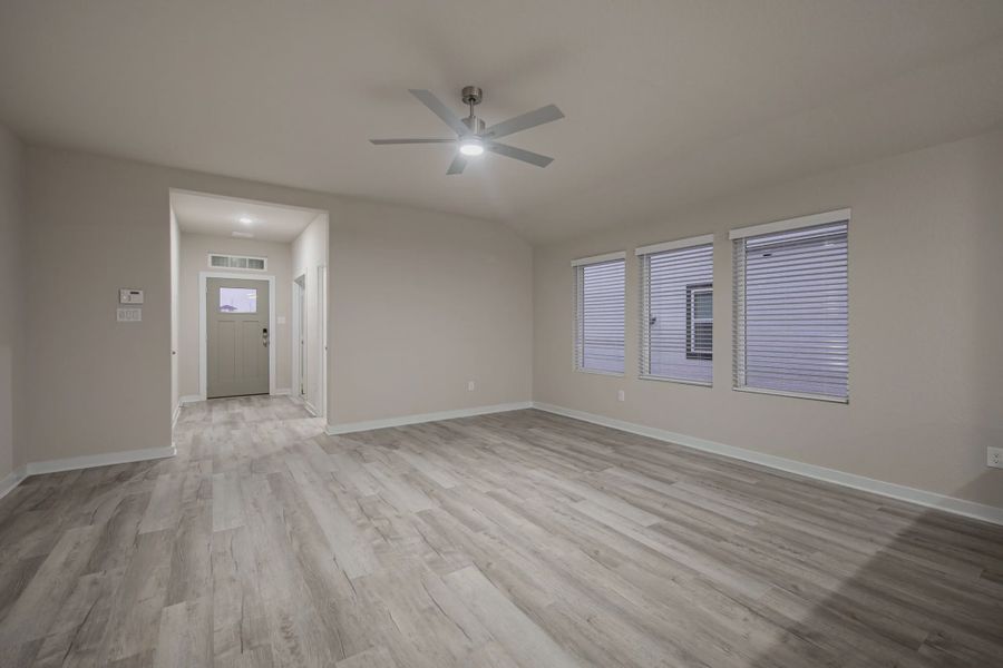 Representative unfurnished interior of a home built from the Gunther by Chesmar Homes in Briarwood, Cypress (Image 5).