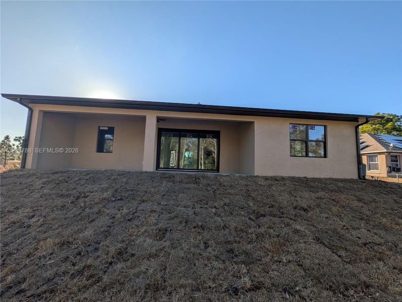 Exterior details and patio area of a home in , Lehigh Acres (Image 12).