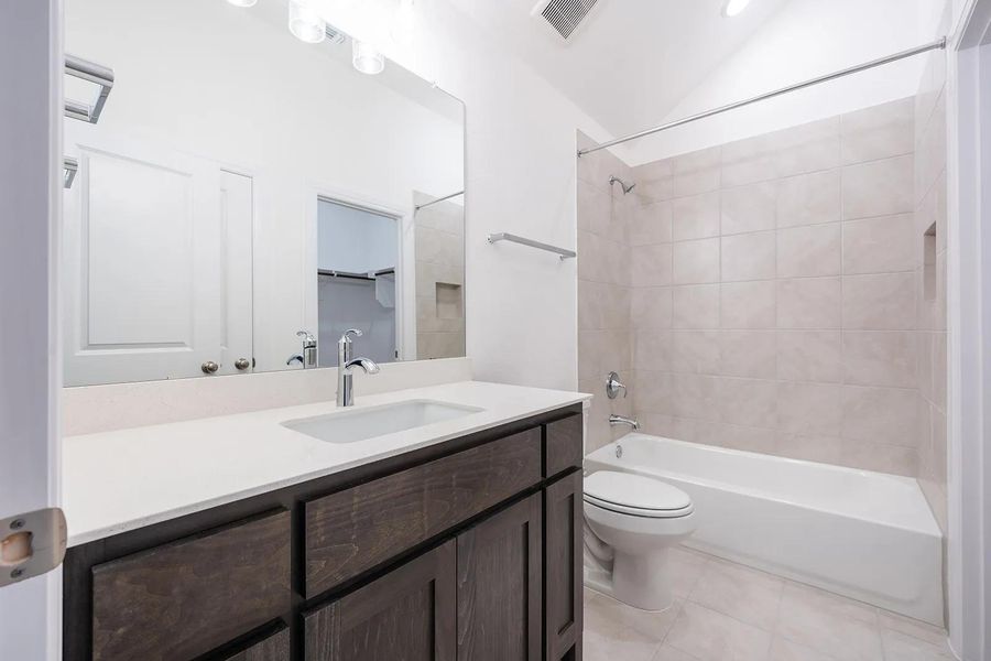 Furnished interior view inside a new home in Caliterra - 70', Dripping Springs (Image 10). Furnished interior view inside a new home in Caliterra - 70', Dripping Springs (Image 10).