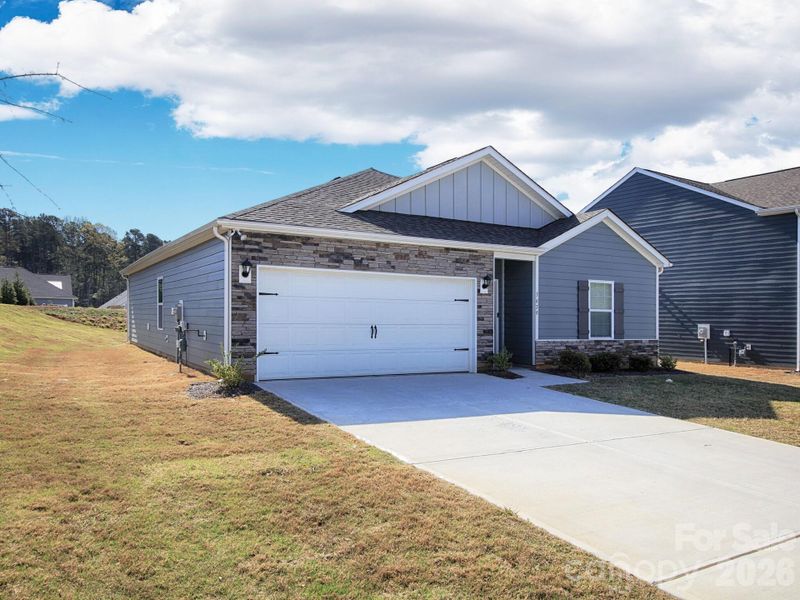Front exterior of a new home in Villas at Sherrills Ford, Terrell, NC, highlighting curb appeal (Image 23).