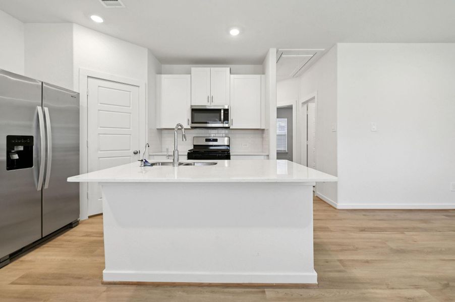 Photo is not of the actual home, but is an inspirational photo of builder’s model home and may depict options, furnishings, and/or decorator features that are not included