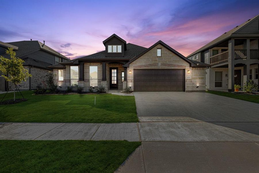 Front exterior of a new home in Bear Creek Classic 60, Lavon, TX, highlighting curb appeal (Image 2). Front exterior of a new home in Bear Creek Classic 60, Lavon, TX, highlighting curb appeal (Image 2).
