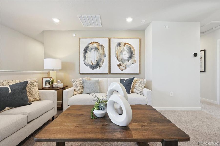 Furnished interior view inside a new home in Legato, Commerce City (Image 6).