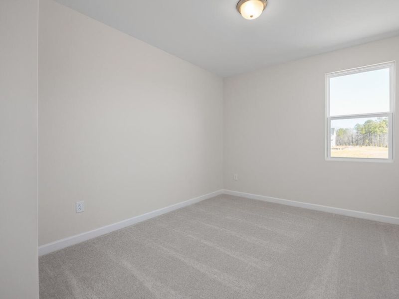 Spacious, unfurnished interior of a new home in Retreat at North Main, Lillington (Image 17).