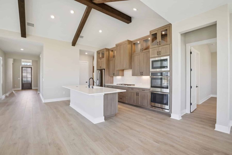 Furnished interior view inside a new home in 6 Creeks, Kyle (Image 15).