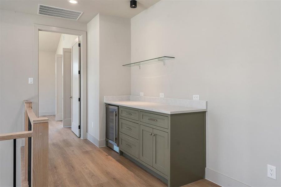 Dry bar on 2nd floor with beverage refrigerator