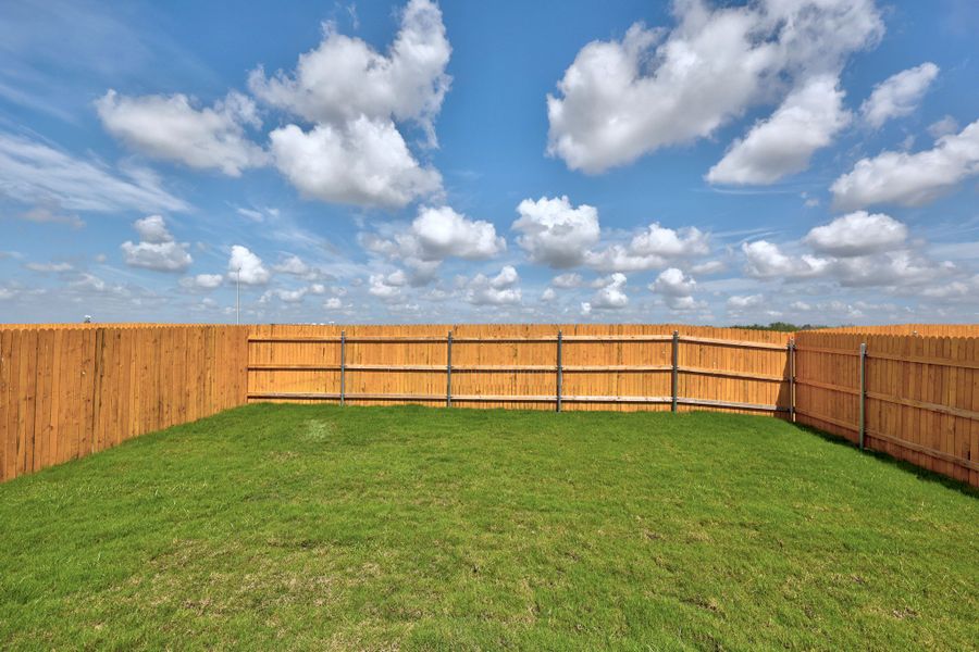 Exterior details and patio area of a home in Trinity Ranch, Elgin (Image 23).