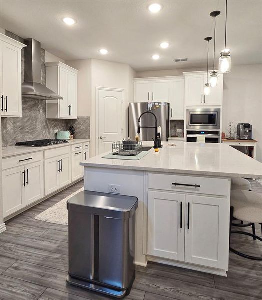 Kitchen featuring with quartz countertops.