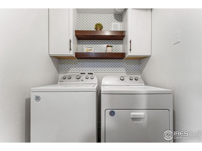 The adorable laundry room.