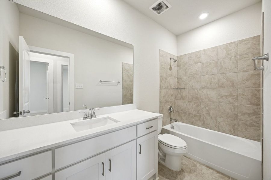 Representative furnished interior of a home built from the The Alamo by Lillian Custom Homes in Freeman Farm, Kaufman (Image 7). Representative furnished interior of a home built from the The Alamo by Lillian Custom Homes in Freeman Farm, Kaufman (Image 7).