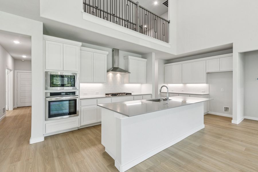 Kitchen in the Mercury home plan by Trophy Signature Homes – REPRESENTATIVE PHOTO Kitchen in the Mercury home plan by Trophy Signature Homes – REPRESENTATIVE PHOTO