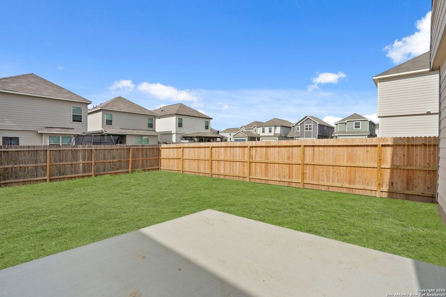 Front exterior of a new home in Melissa Ranch, San Antonio, TX, highlighting curb appeal (Image 16).