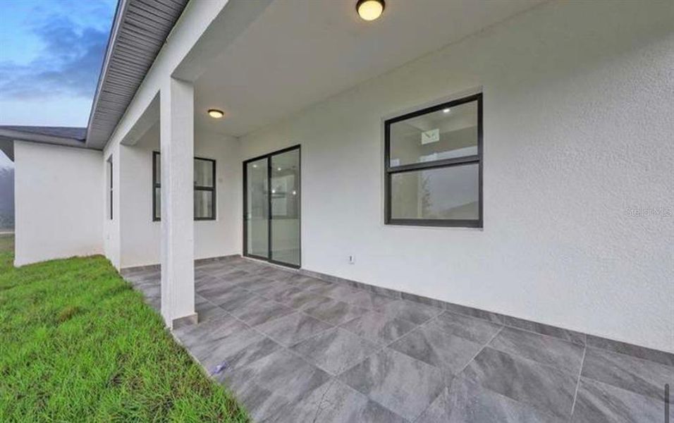 Exterior details and patio area of a home in , Lehigh Acres (Image 3). Exterior details and patio area of a home in , Lehigh Acres (Image 3).