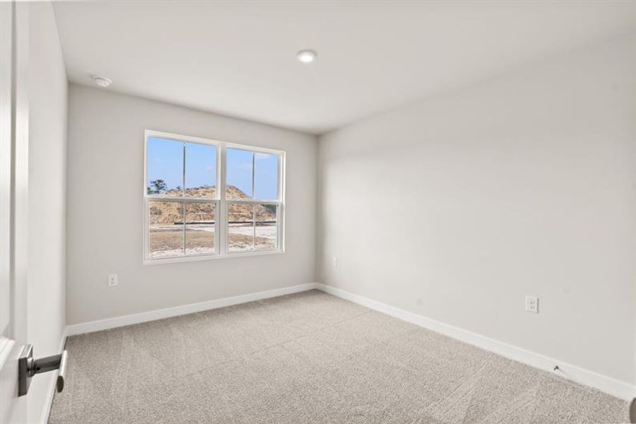 Spacious, unfurnished interior of a new home in Lakes at Riverbend Townhomes, Navassa (Image 18).