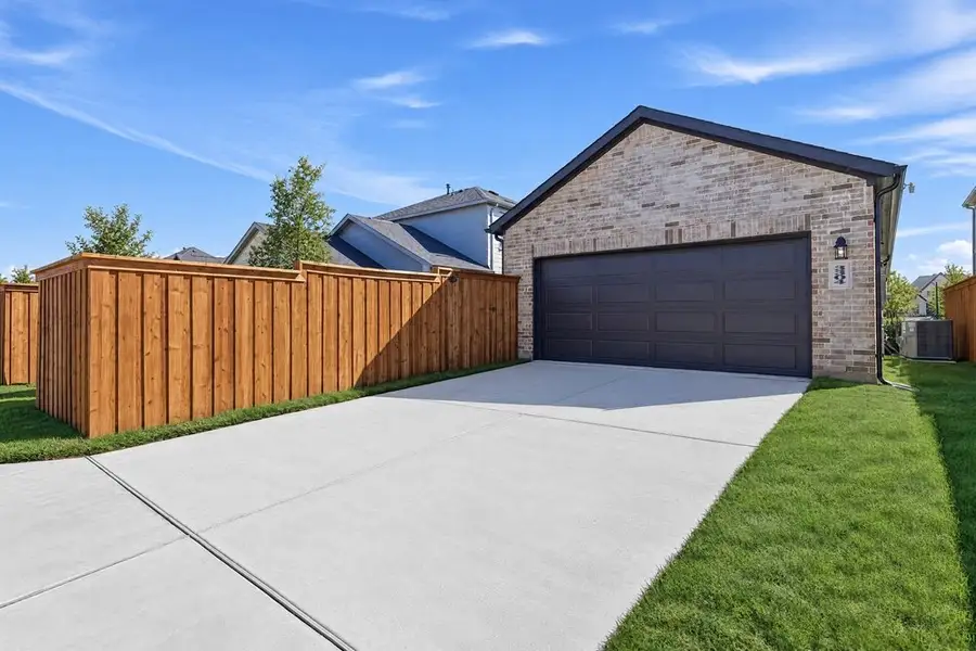 Front exterior of a new home in North Sky Celina, Celina, TX, highlighting curb appeal (Image 2). Front exterior of a new home in North Sky Celina, Celina, TX, highlighting curb appeal (Image 2).