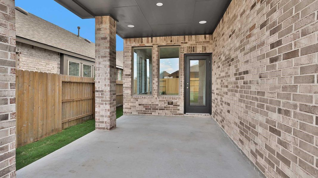 Exterior details and patio area of a home in Brookewater 40', Rosenberg (Image 3). Exterior details and patio area of a home in Brookewater 40', Rosenberg (Image 3).