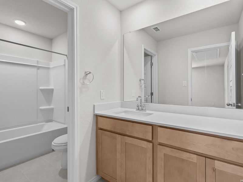Furnished interior view inside a new home in Meadows at Oak Creek, San Antonio (Image 13).