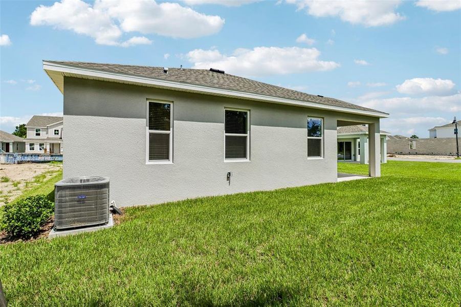 Exterior details and patio area of a home in Trinity Gardens, Deland (Image 18). Exterior details and patio area of a home in Trinity Gardens, Deland (Image 18).