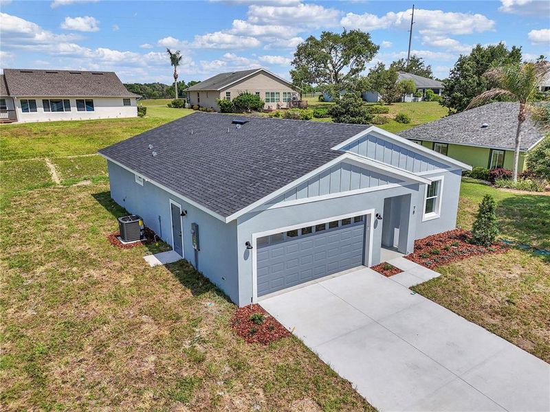 Front exterior of a new home in , Umatilla, FL, highlighting curb appeal (Image 1). Front exterior of a new home in , Umatilla, FL, highlighting curb appeal (Image 1).