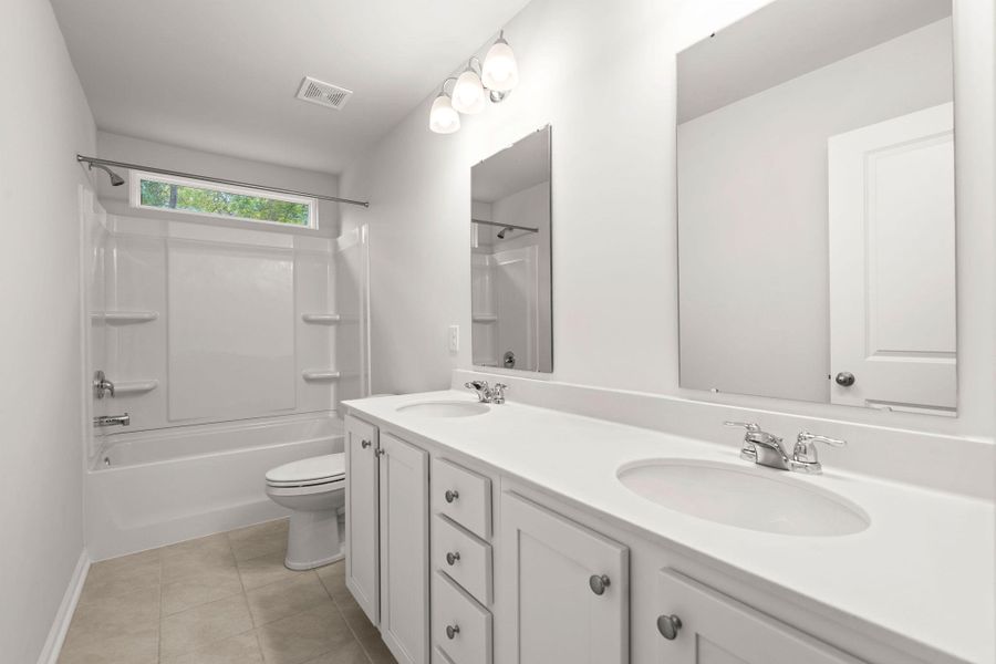 Furnished interior view inside a new home in The Ponds, Summerville (Image 9).