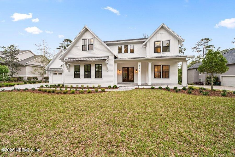 Front exterior of a new home in , Jacksonville, FL, highlighting curb appeal (Image 34).